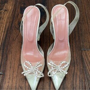 Amina Muaddi Clear Heels with Rhinestone Bow